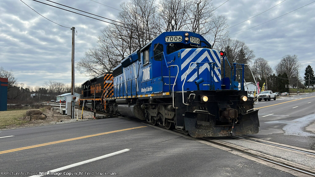WE 7006 crosses Gilchrist Rd. on the Akron Sub.